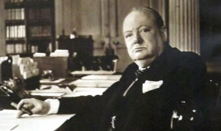 Winston Churchill Black and White Photo Sitting at Desk
