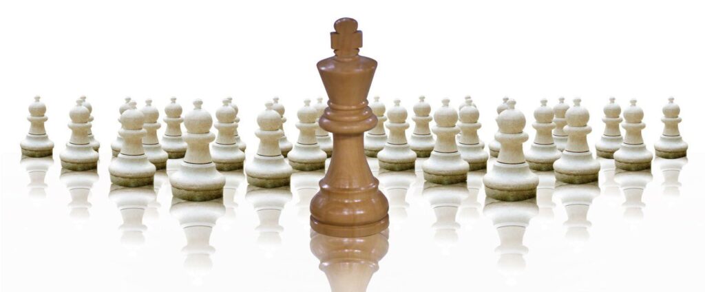 Image of chess pieces on a board